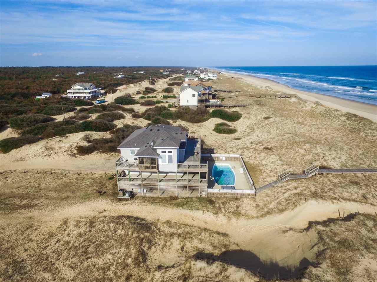 Corolla, North Carolina 27927-0000, 7 Bedrooms Bedrooms, ,6 BathroomsBathrooms,Single family - detached,For sale,Sandfiddler Road,97715