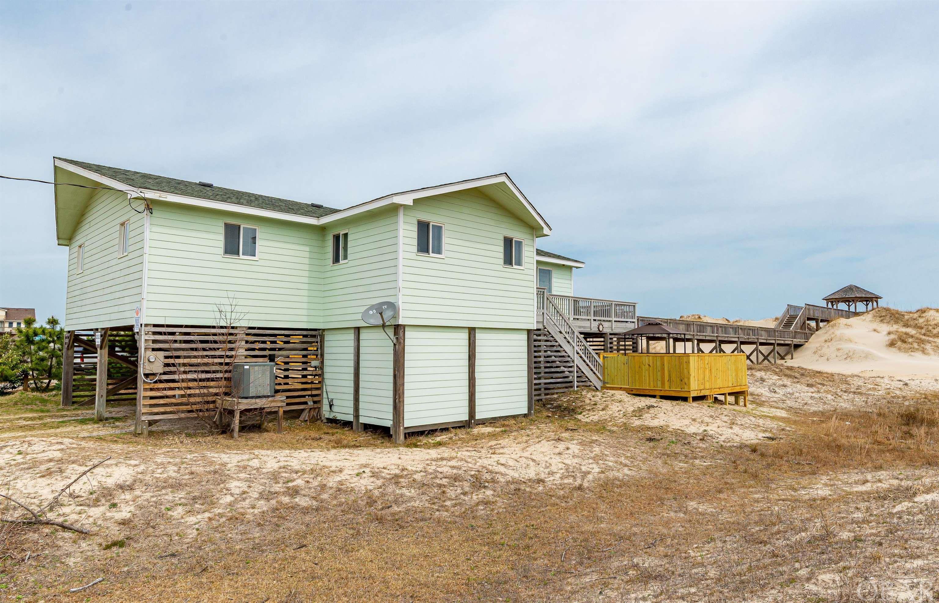 Corolla, North Carolina 27927, 4 Bedrooms Bedrooms, ,2 BathroomsBathrooms,Single family - detached,For sale,Sandfiddler Road,118750